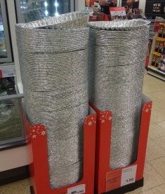 Stacks of aluminium foil trays could be seen in supermarkets in the build up to Christmas such as these in a Sainsbury's in London
